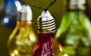 three red and green glass bottles