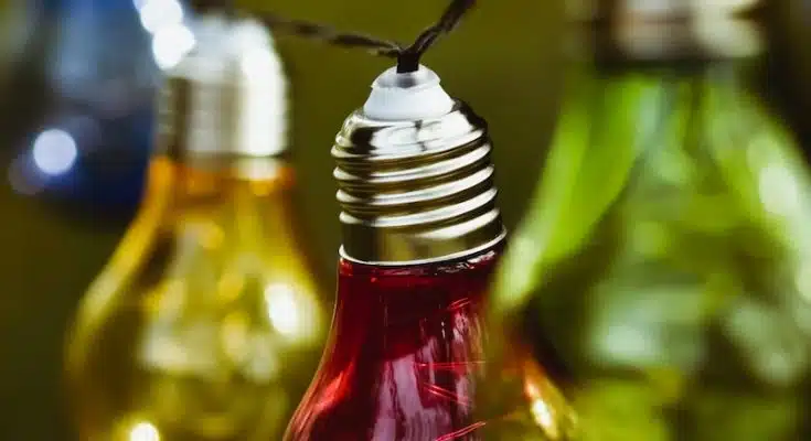 three red and green glass bottles